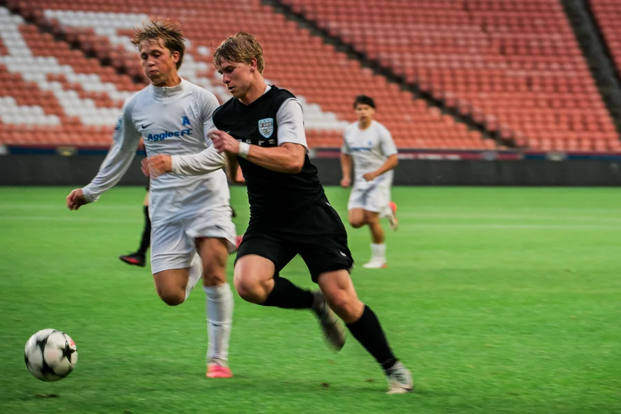 Competing for every ball at the State Cup final.