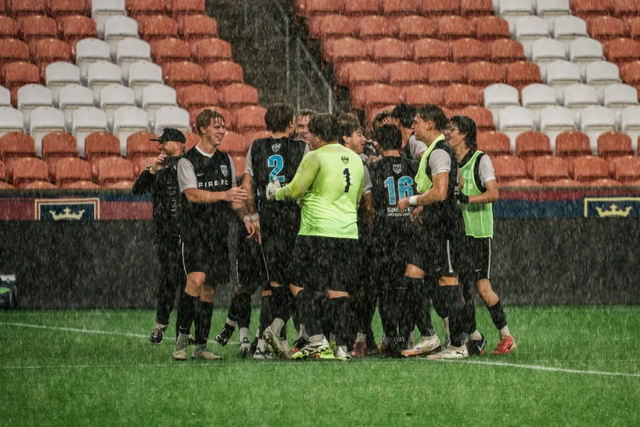 The Fire Family comes together in a team huddle.