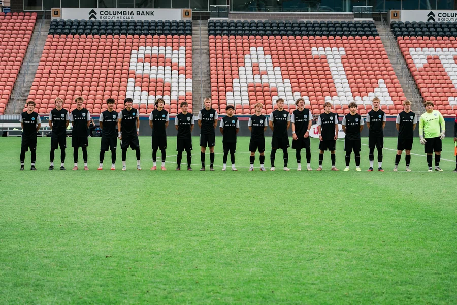 Fire FC boys line up before the State Cup final.