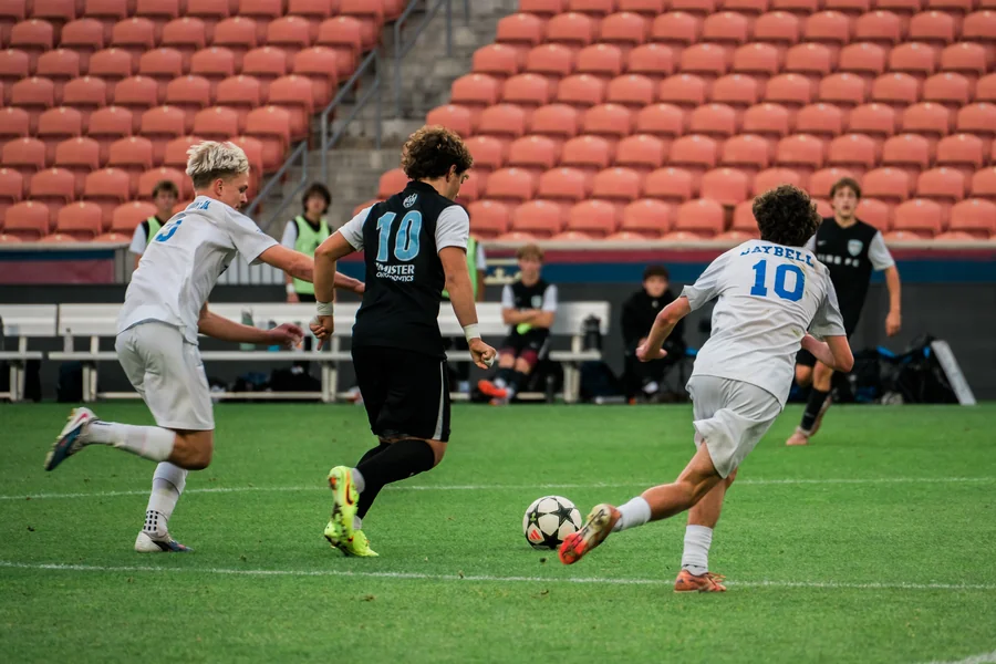Fire FC drives forward through midfield at State Cup.