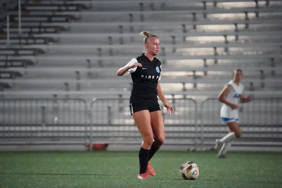 Fire FC pushes through midfield against Utah Surf.
