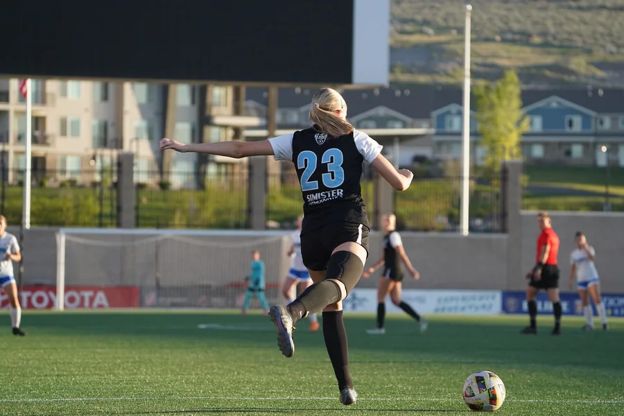 Fire FC prepares to send the ball forward at State Cup.